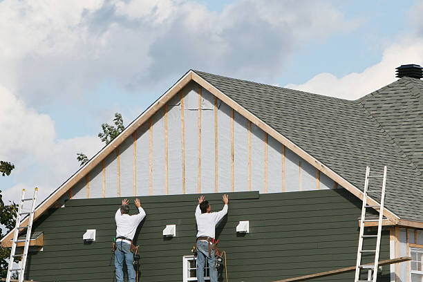 Professional Siding Installation technician working in Davidson, NC